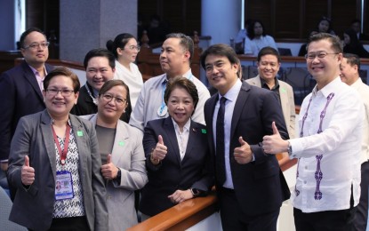 <p><strong>LOWERING RETIREMENT AGE.</strong> Senator Ramon Revilla Jr. (2nd from right) poses for a photo on Wednesday (Sept. 20, 2023) with Senator Sherwin Gatchalian (right) and Civil Service Commission officials led by Commissioner Aileen Lizada (center) after delivering his sponsorship speech on Senate Bill No. 2444. The measure seeks to lower the optional retirement age for government workers to 56 from 60 years old. <em>(PNA photo by Avito Dalan) </em></p>