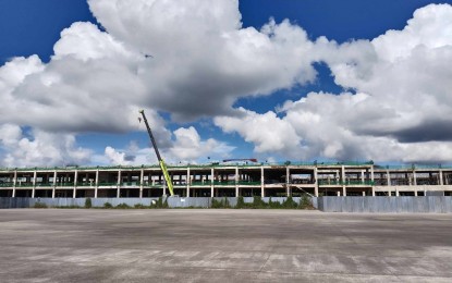 <p><strong>IMPROVEMENT.</strong> The ongoing construction of Tacloban Airport passenger terminal building in this Sept. 20, 2023 photo. The Civil Aviation Authority of the Philippines (CAAP) has approved the catch-up plan to expedite the PHP759 million Tacloban Airport passenger terminal building construction to ensure its completion by next year. <em>(PNA photo by Sarwell Meniano)</em></p>