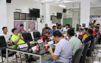 <p><strong>STAY HOME.</strong> Batangas Provincial Disaster Risk Reduction and Management Office (PDRRMO) head, Dr. Amor Banuelos-Calayan, urges residents around Taal Lake to avoid non-essential activities outside the house amidst the renewed emission of volcanic smog (vog). The PDRRMO led a meeting on Wednesday (Sept. 20, 2023), together with its local counterparts, to discuss the effects of vog in their towns. <em>(Photo courtesy of Batangas PIO)</em></p>