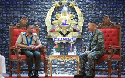 <p><strong>EXPANDING TIES.</strong> AFP deputy chief of staff for education, training and doctrine, Maj. Gen. Noel Beleran (right) discusses education and training plans with Brig. Gen. Kazi Anisuzzaman (left) of the Directing Staff Army-6, National Defense College of Bangladesh on Wednesday. The AFP on Thursday (Sept. 21, 2023) said the Philippines and Bangladesh are looking to expand cooperation through education and training as part of efforts to ensure peace in the Indo-Pacific Region. <em>(Photo courtesy of the AFP)</em></p>