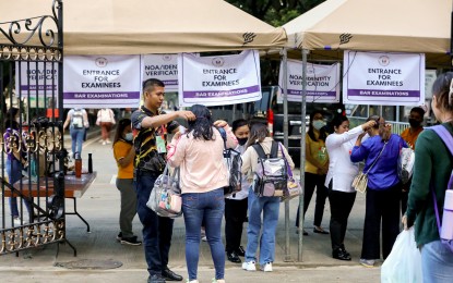 <p><strong>BAR EXAMS.</strong> Examinees troop to the University of Santo Tomas in Manila on Sept. 20, 2023, for the second day of the 2023 Bar Examinations. The Supreme Court on Monday (April 8, 2024) said 12,246 registrants have signed up for the 2024 Bar Examinations, which will be held on September 8, 11, and 15 in multiple sites throughout the country. <em>(PNA photo by Yancy Lim)</em></p>