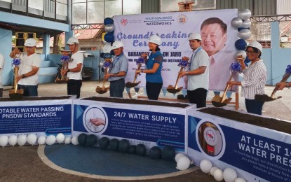 <p><strong>GROUNDBREAKING</strong>. City councilors Ely Estante and Miguel Treñas (4th and 6th from left) and South Balibago Waterworks president Cristina Isabelle Panlilio-Alejandro (center) lead the groundbreaking for the pipelaying of water supply and distribution in Barangay Bito-on, Jaro district in Iloilo City on Thursday (Sept. 21, 2023). The project targets to benefit over 1,000 households or around 10,000 individuals when completed. <em>(PNA photo by PGLena)</em></p>