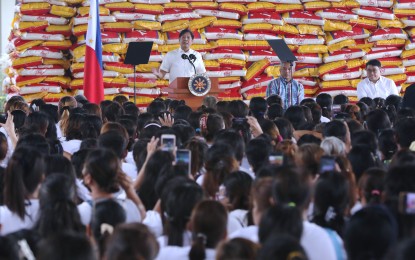 <p class="p1"><strong>RICE DISTRIBUTION.</strong> President Ferdinand R. Marcos Jr. delivers a speech during the distribution of 1,200 sacks of confiscated rice to identified beneficiaries of the Pantawid Pamilyang Pilipino Program in the City of General Trias, Cavite on Friday (Sept. 22, 2023). The imported rice donations are from the 42,180 sacks seized during a recent warehouse raid in Zamboanga City. <em>(PNA photo by Joey O. Razon)</em></p>