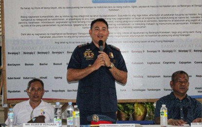 <p><strong>AREAS OF CONCERN</strong>. Col. Fernando Cunanan Jr. (center), Albay Police Provincial Office (APPO) Director, gives his message during a peace covenant signing and candidates' forum in Bacacay town on Wednesday (Sept. 19, 2023). The APPO identified 96 barangays as Areas of Concern in relation to the Oct. 30 Barangay and Sangguniang Kabataan Elections.<em> (Photo courtesy of Albay PPO)</em></p>