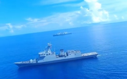 <p><strong>JOINT SAIL.</strong> The Philippine Navy missile frigate BRP Antonio Luna and the Royal Canadian Navy's HMCS Ottawa conduct a bilateral sail activity in an undisclosed location in the West Philippine Sea on Thursday (Sept. 21, 2023). The Armed Forces of the Philippines said Friday (Sept. 22) that the joint sail activity signifies a shared commitment in promoting a rules-based international order in the WPS.<em> (Photo courtesy of AFP Western Command)</em></p>