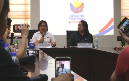 <p><strong>ALL SET</strong>. Davao de Oro 1st District Rep. Maria Carmen Zamora (left) and Chic Salamida of the Bagong Pilipinas Serbisyo Fair secretariat discuss the various services available during a press briefing at the Monkayo municipal hall on Friday (Sept. 22, 2023). As of posting time, a total of 54,935 residents have registered online to avail of the services to be offered by various government agencies during the weekend fair.<em> (PNA photo by Robinson Niñal Jr.)</em></p>