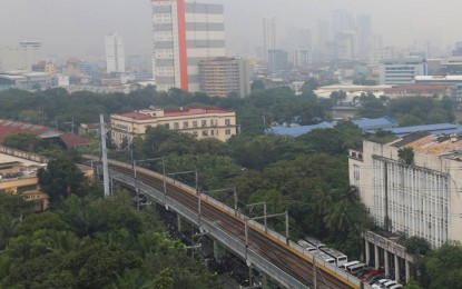 <p><strong>OVERCAST.</strong> High-rise buildings in Metro Manila are barely visible as seen from the Manila Clock Tower Museum in Manila City Hall due to smog blanketing the metropolis and nearby areas on Friday (Sept. 22, 2023). Classes at all levels, both public and private schools, in Metro Manila have been suspended due to the smog formation.<em> (PNA photo by Yancy Lim)</em></p>