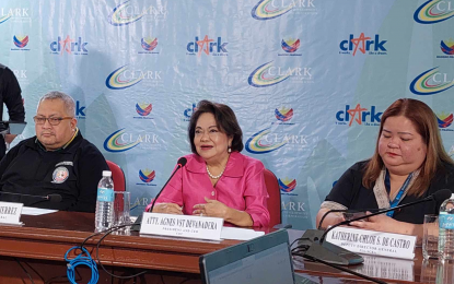<p><strong>MEDIA FORUM.</strong> Clark Development Corp. president and CEO Agnes VST Devanadera (center) discusses plans to reintroduce the city of Clark in Pampanga as an industrial park and tourist destination, during the weekly media forum hosted by the Philippine Information Agency at the PIA Building, Visayas Avenue, Quezon City on Friday (Sept. 22, 2023). With her are PIA Director Generals Adolfo Ares Gutierrez (left) and Katherine de Castro.<em> (PNA photo by Noemi Reyes)</em></p>