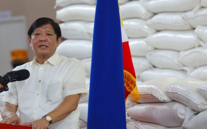 <p><strong>LOWER RICE PRICES.</strong> President Ferdinand R. Marcos Jr. leads the distribution of rice to about 2,000 qualified beneficiaries in Iriga City, Camarines Sur on Saturday (Sept. 23, 2023). In an interview after the rice distribution, Marcos said he expects lower prices of rice due to the early <em>palay</em> harvest.<em> (PNA photo by Joan Bondoc)</em></p>