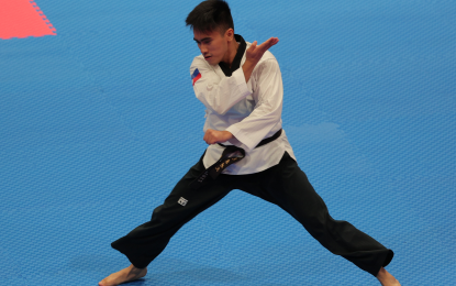 <p><strong>FIRST MEDALIST.</strong> Taekwondo jin King Patrick Perez emerges as the first medal winner of the Philippines in the 19th Asian Games in Hangzhou, China on Sunday (Sept. 24, 2023). Perez lost in the semifinals to settle for bronze in the men’s individual poomsae at Lin’an Sports Culture and Exhibition Centre. <em>(Photo courtesy of PSC-POC Media Pool)</em></p>