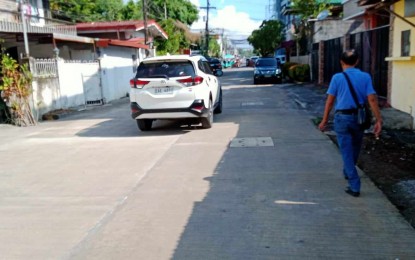 <p><strong>FLOOD CONTROL PROJECT</strong>. A private vehicle passes through the completed flood-mitigating project in Legazpi that doubles as an access road along the city’s Old Albay District, on Monday (Sept. 25, 2023). The PHP69-million, one-kilometer project has been observed to have minimized flooding in five low-lying villages. <em>(PNA photo by Emmanuel Solis)</em></p>