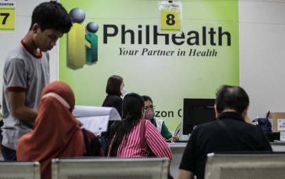 <p><strong>NORMAL OPS.</strong> It’s business as usual at the Philippine Health Insurance Corp branch in Mother Ignacia Avenue, Quezon City, on Sept. 26, 2023. President Ferdinand R. Marcos Jr. on Wednesday (Feb. 28, 2024) said he will decide “very soon” on the implementation of the Philippine Health Insurance Corp.’s (PhilHealth) 5-percent premium rate increase. <em>(PNA photo by Joan Bondoc)</em></p>