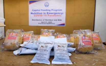 <p><strong>FEEDING PROGRAM</strong>. Fresh carabao’s milk and nutribuns are prepared for distribution to children aged 3 years to 5 years in the province of Ilocos Norte, in this undated photo. The 120-day feeding program aims to improve the nutrition status of children. <em>(Photo courtesy of the Ilocos Norte government)</em></p>