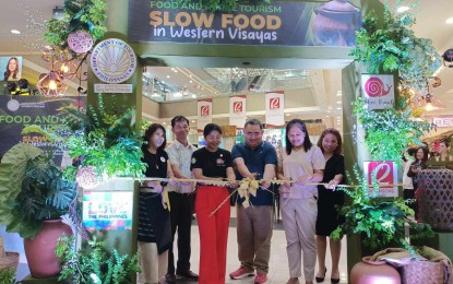 <p><strong>SLOW FOOD</strong>. DOT Regional Director for Western Visayas Crisanta Marlene Rodriquez (3rd from left) and NEDA Regional Director Arecio Casing Jr. (4th from left) cut the ribbon to officially launch Slow Food in Western Visayas at the Robinsons Place Jaro in Iloilo City on Thursday (Sept. 28, 2023). Rodriquez said promoting slow food boosts the advocacy for biodiversity conservation. <em>(PNA photo by PGLena)</em></p>