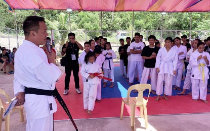 <p><strong>SPORTS-MINDED.</strong> Dinagat Islands Gov. Nilo Demerey Jr. (left) opens the two-day Karate Cup in San Jose, Dinagat Islands on Saturday afternoon (Sept. 30, 2023), one of the highlights of the weeklong “Bugkosan sa Isla 2023 Festival.” He said he wants the youth to develop discipline, confidence and self-esteem through sports. <em>(PNA photo by Alexander Lopez)</em></p>
<p> </p>
<p> </p>