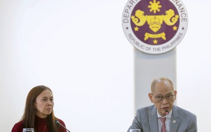 <p><strong>DOLLAR BONDS</strong>. Bureau of the Treasury Officer-in-Charge Sharon Almanza (left) and Finance Secretary Benjamin Diokno share at a briefing on Friday (Sept. 29, 2023) that demand for the latest retail onshore dollar bonds (RDB 2) exceeded the USD200 million initial offering. As of Sept. 27, the government has so far raised USD611 million from the RDB 2 offering. <em>(Photo courtesy of DOF Facebook)</em></p>