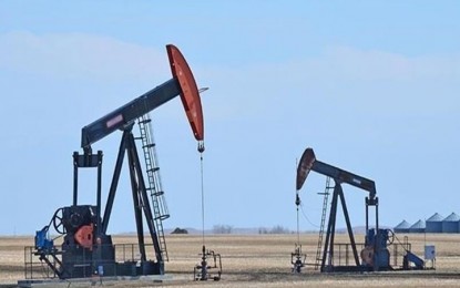 Oil up as investors await OPEC production decision