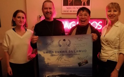 <p><strong>INTERNATIONAL AWARD.</strong> Acclaimed Filipino director Anton Juan (2nd from right) shows the poster of “Amon Banwa sa Lawod” (Our Island of the Mangrove Moons) with fellow filmmakers at the Louth International Film Festival in Dundalk, Ireland. On Sunday (Oct. 1, 2023), the full-length film, which showcases the mangrove island of Suyac in Sagay City, Negros Occidental, won the award for Best International Feature. (<em>PNA photo from Our Island of the Mangrove Moons Facebook page</em>)</p>