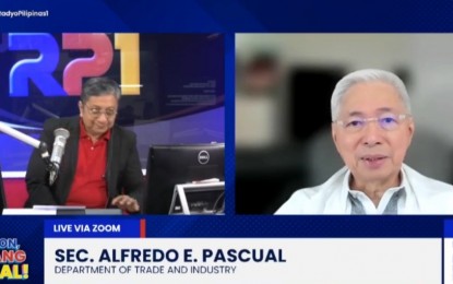 <p><strong>TAMING PRICES. </strong>Trade Secretary Alfredo Pascual (right)<em> </em>discusses how the public will benefit from the Executive Order No. 41 recently signed by President Ferdinand R. Marcos Jr. The EO prohibits collection of pass-through fees from motor vehicles transporting goods on national roads. <em>(Screenshot from Radyo Pilipinas Facebook page) </em></p>