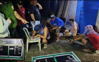 <p><strong>ARRESTED.</strong> Five drug suspects (right) hide their faces following their arrest inside a drug den in Koronadal City, South Cotabato, on Tuesday (Oct. 3, 2023).  At least 14 drug suspects were arrested while two drug dens were dismantled by the Philippine Drug Enforcement Agency in the Soccsksargen Region from Oct. 1-3, 2023. <em>(Photo courtesy of PDEA-12)</em></p>