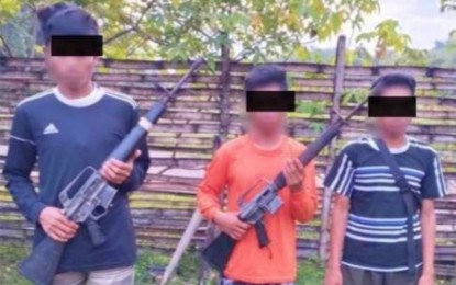 <p><strong>SURRENDER.</strong> Three fighters of the New People’s Army (NPA) surrendered to the 56th Infantry Battalion and handed over two high-powered firearms in Barangay Palma Gil, Talaingod, Davao Del Norte, on Sept. 30, 2023. The surrenderers consisted of a vice-squad leader and two followers of the NPA Sub-Regional Sentro De Grabibad, North Central Mindanao Regional Committee. <em>(Photo courtesy of 10ID)</em></p>