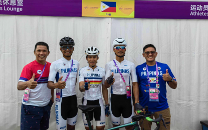<p><strong>RARING TO GO</strong>. Cycling team of the Philippines is ready for the medal race in the 19th Asian Games in Hangzhou, Zhejiang, China on Thursday (Oct. 4, 2023). (L-R, wearing cycling jersey) Joshua Pascual, Jonel Carcueva and Ronald Oranza will be competing for the first time in the quadrennial meet. <strong><em>(Contributed photo)</em></strong></p>