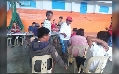<p><strong>CASH AID</strong>. One-hundred fifty nine persons with disabilities (PWDs) in Kalinga province received on Thursday (Oct. 5, 2023) PHP3,800 cash aid each under the 10-day cash-for-work program of the Department of Social Welfare and Development. The beneficiaries were helped by their families for the tasks that include clean-up drives along government or public places, gardening and tree planting, and cleaning and declogging of canals. <em>(PNA photo by Liza T. Agoot)</em></p>