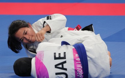 <p><strong>2nd GOLD FOR PH.</strong> Margarita “Meggie” Ochoa beats Abdulla Alquees of the United Arab Emirates (UAE) in the women’s -48kg. class of the jiujitsu competitions in the 19th Asian Games at the XSL Gymnasium in Hangzhou, China on Thursday (Oct. 5, 2023). It was the second gold for the Philippines after World No. 2 pole vaulter EJ Obiena won the first in record fashion on Sept. 30, 2023.<em> (Photo from the PSC-POC Media Group)</em></p>