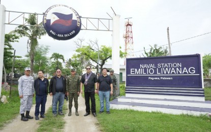 <p><strong>ASSERTING PH SOVEREIGNTY.</strong> House of Representatives Speaker Ferdinand Martin G. Romualdez (2nd from right), together with other lawmakers, visits Pag-asa Island on Oct. 5, 2023, to reassure troops stationed there that Congress would fund their infrastructure needs. Romualdez has given his blessing to the civilian-led "Atin Ito Coalition," which is scheduled to make the long trip from Palawan to the disputed parts of the West Philippine Sea on Dec 10. <em>(Photo courtesy of Speaker Romualdez’s office)</em></p>