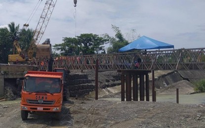 <p><strong>VITAL LINK.</strong> The reconstruction of Antique province’s Paliwan Bridge in Bugasong town, destroyed during a severe tropical storm in October 2022, is expected to be completed by April 2024. President Ferdinand R. Marcos Jr. was in the province on Friday (Oct. 6, 2023) and ordered that its repair be expedited to ensure smooth movement of goods and services. <em>(Photo courtesy of Rep. AA Legarda Facebook)</em></p>