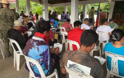 <p><strong>LOYALTY PROMISE.</strong> At least 54 members of the Communist Party of the Philippines-New People’s Army (CPP-NPA) and their supporters in the provinces of Albay and Sorsogon pledged allegiance to the national government during a ceremony at the 903rd Infantry Brigade headquarters in Castilla town, Sorsogon province on Wednesday (Oct. 11, 2023). The rebel returnees also turned over 28 assorted firearms.<em> (PNA photo by Connie Calipay)</em></p>