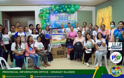 <p><strong>SUPPORT TO SCHOOLS.</strong> Heads of 15 elementary schools from the different municipalities in the province of Dinagat Islands receive office equipment and learning materials worth PHP2.2 million under the Department of Health’s Learning Institutions Program. Marichu Demerey (seated 1st from right), the executive assistant of Governor Nilo Demerey Jr., led the distribution activity on Tuesday (Oct. 10, 2023) at the provincial capitol situated in San Jose municipality. <em>(Photo courtesy of Dinagat Islands PIO)</em></p>