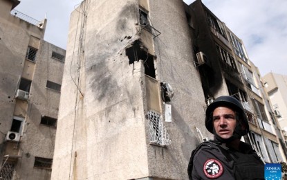 <p><strong>WAR DAMAGE.</strong> A building in Ashkelon, Israel is damaged following Hamas rocket attacks from Gaza. The Hamas group on Saturday (Oct. 7, 2023) launched a surprise attack on Israeli towns adjacent to the Gaza Strip, prompting Israel to launch retaliatory strikes.<em> (Ilan Assayag/JINI via Xinhua)</em></p>