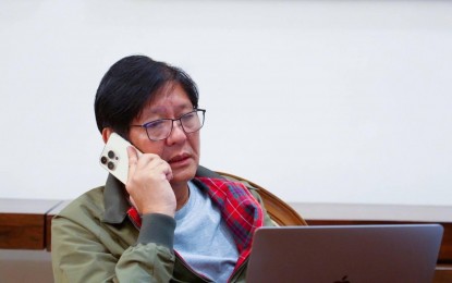 <p><strong>PHONE CALL.</strong> President Ferdinand R. Marcos Jr. speaks with the relatives of the two Filipinos killed in Israel during a phone call on Wednesday (Oct. 11, 2023). Marcos personally extended his condolences and sympathies to the families of the victims and pledged to provide them with full government assistance. <em>(Photo from President Marcos' official Facebook page)</em></p>
