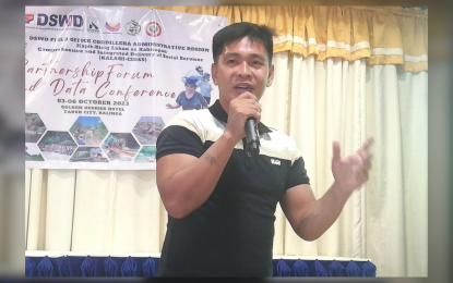 <div dir="auto"><strong>LIVING PROOF</strong>. Cris Reshon Guiral, now 30 years old, shares his experience during the Department of Social Welfare and Development partner’s forum in Tabuk City, Kalinga province on Oct. 4 , 2023 as a member of a family who graduated from the Pantawid Pamilyang Pilipino Program (4Ps). He said they waived their slot in 2018 because he and another sibling were then working already in DSWD. <em>(PNA photo by Liza T. Agoot)</em></div>