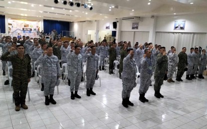 <p><strong>EXERCISE</strong>. Naval Forces Central Deputy Commander Capt. Raul A. Regis (front row, center) joins the rest of the participants during the opening ceremony of the Philippine Navy (PN) Mobilization Exercise (MOBEX) 2023 at the Arevalo campus of the John B. Lacson Foundation Maritime University in Iloilo City on Thursday (Oct. 12, 2023). Regis said the reserve force would be equipped with skills and capabilities to become force multipliers during operations and emergencies. <em>(PNA photo by PGLena)</em></p>
<p><em> </em></p>
<p> </p>