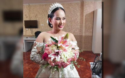 <p><strong>LOVING DAUGHTER AND SISTER</strong>. Angelyn Aguirre, an overseas Filipino worker in Israel, on her wedding day in September 2022. Her family was left grieving after she was killed during a terrorist attack in Israel. <em>(Photo courtesy of Angelyn's family)</em></p>