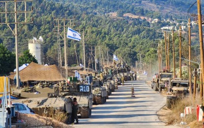 <p>Israeli tanks and troops are stationed on Israel's northern front with Lebanon on Oct. 15, 2023. The Israel Defense Forces denied responsibility for a blast at a Gaza hospital on Tuesday (Oct. 17, 2023), saying it was the result of a failed rocket launch by Palestinian Islamic Jihad. <em>(Photo by Eytan Schweber/Tazpit Press Service)</em></p>
