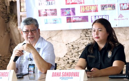 <p><strong>CYBERATTACKS</strong>. Bureau of Immigration Commissioner Norman Tansingco (left) and spokesperson Dana Sandoval (right) speak at the Manila City Hall Reporters Association's forum on Tuesday (Oct. 17, 2023). Tansingco assured the public that the bureau could withstand any cyberattack. <em>(PNA photo by Yancy Lim)</em></p>