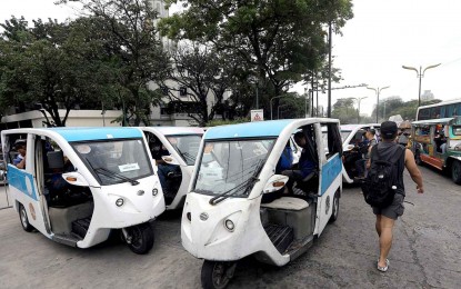 <p><strong>ELECTRIC TRICYCLES</strong>. The Manila City government provides electronic tricycles or e-trikes to serve affected passengers during the first day of a nationwide transport strike in Metro Manila on Monday (Oct. 16, 2023). Overall, Manila's Oplan Libreng Sakay services, including these e-trikes, have served over 5,000 passengers that day. <em>(PNA photo/Yancy Lim)</em></p>