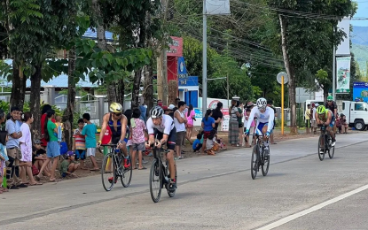 <p><strong>TRIATHLON EVENT</strong>. Triathletes are engaged in the 90-kilometer bike race during the Ironman 70.3 Puerto Princesa in November 2022. The city is once again gearing up to host the same event on Nov. 12, 2023.<em> (File photo by Izza Reynoso)</em></p>