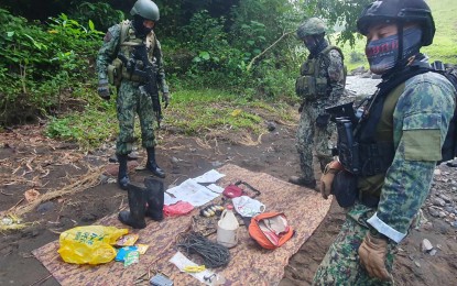 <p><strong>DISCOVERY.</strong> Police operatives have recovered several rounds of ammunition and what appears to be bomb components on Thursday (Oct. 17, 2023) at a cave in Mabinay, Negros Oriental. The cave is believed to be a temporary harbor area of alleged Communist New People's Army members, the Negros Oriental Police Provincial Office said on Wednesday (Oct. 18, 2023).  <em>(Photo courtesy of NOPPO)</em></p>