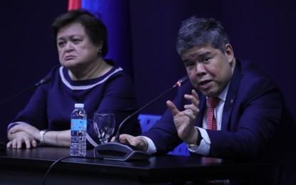 <p><strong>WAR UPDATE.</strong> Foreign Affairs Undersecretaries Eduardo Jose de Vega (right) and Ma. Theresa Lazaro on Wednesday (Oct. 18, 2023) discuss the latest updates about overseas Filipino workers (OFWs) affected by the Israel-Hamas conflict during a press briefing at the DFA office in Pasay City. The Department of Foreign Affairs on Thursday (Oct. 19, 2023) confirmed that another Filipino has been killed in Israel following the Hamas attack on the country. <em>(PNA photo by Avito Dalan)</em></p>