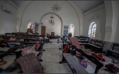 <p><strong>DEVASTATED.</strong> An interior view of the chapel at Al-Ahli Baptist Hospital after it was hit in Gaza City, Gaza on October 18, 2023. The bombing has killed hundreds of civilians. <em>(Anadolu)</em></p>