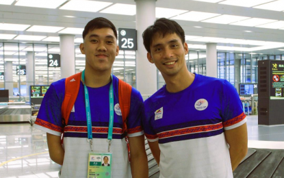 <p><strong>TAEKWONDO BET.</strong> One-armed taekwondo jin Allain Ganapin (left) with coach Gershon Bautista in this undated photo. Ganapin is determined to win medal in the 4th Asian Games in Hangzhou, China on Oct. 22-28, 2023. <em>(PSC media pool photo)</em></p>