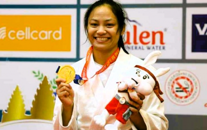 <p><strong>HOPEFUL.</strong> A file photo shows Jenna Kaila Napolis after winning the gold medal at the Cambodia SEA Games last May. Napolis, a bronze medalist in the recent Hangzhou Asian Games, will lead the Philippine campaign at the World Combat Games scheduled from Oct. 20 to 30 at the King Saud University Arena in Riyadh, Saudi Arabia. <em>(Contributed photo)</em></p>