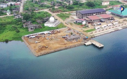 <p><strong>UNDER RESTORATION.</strong> An aerial view of the ongoing reconstruction and upgrade of the port of Marawi in Marawi City, Lanao del Sur on Friday (Oct. 20, 2023). The Philippine Ports Authority said the project is 70 percent complete and will be fully operational by October next year. <em>(Photo courtesy of PPA)</em></p>