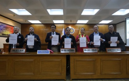 <p style="text-align: left;"><strong>STREAMLINING SERVICES</strong>. Commission on Elections (Comelec) Chairperson George Erwin Garcia signs a memorandum of understanding with Anti-Red Tape Authority (ARTA) Director General Ernesto Perez and other officials for the streamlining of documentation and services in Manila on Friday (Oct. 20, 2023). Garcia vowed to abide by the ARTA guidelines to push for bureaucratic efficiency. <em>(PNA photo by Yancy Lim)</em></p>