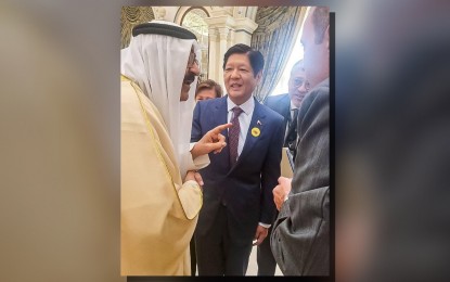 <p><strong>CORDIAL MEETING.</strong> President Ferdinand R. Marcos Jr. (right) holds a brief meeting with Kuwaiti Crown Prince Sheikh Mishal Al-Ahmad Al-Jaber Al-Sabah on the sidelines of the Association of Southeast Asian Nations - Gulf Cooperation Council Summit in Riyadh, Saudi Arabia on Friday (Oct. 20, 2023). The Crown Prince requested the meeting to discuss with Marcos the labor relations between the Philippines and Kuwait. <em>(Photo courtesy of the Presidential Communications Office)</em></p>