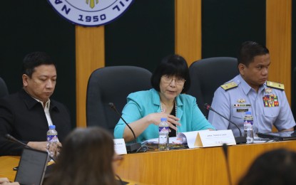 <p><strong>'DEPLORABLE' ACT.</strong> Department of Foreign Affairs spokesperson Ma. Teresita Daza (center) says the Chinese ambassador has been summoned on Monday (Oct. 23, 2023) morning after the “illegal, dangerous, provocative and deplorable” actions of the Chinese Coast Guard near Ayungin Shoal on Oct. 22. In a press briefing at the National Security Council office in Quezon City, Daza said such incidents bolster the case that China is the aggressor for undertaking dangerous maneuvers and blockades. <em>(PNA photo by Joey O. Razon)</em></p>